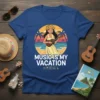T-shirt with "Music Is My Vacation" text and a hula girl playing ukulele on a tropical beach sunset