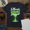 T-shirt with the quote "Music is STICKY so make sure what is sticking is good" featuring dripping green slime and
