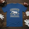 Blue t-shirt featuring "Mustang Football" text, a running horse graphic, and two footballs with "FCA" on them