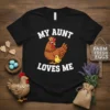 My Aunt Loves Me text with a cartoon chicken and chick graphic on a black t-shirt