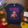 My Auntie Don't Play About Me! text with a lion holding a heart graphic on a navy t-shirt