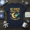 My Auntie Loves Me To The Moon & Back t-shirt with a smiling moon, Earth, and satellites