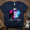 Navy t-shirt with "My Beats For Cats" text, a black cat silhouette, and a colorful heart graphic with a heartbeat