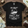 Black t-shirt with white text "My Boat Doesn't Run On Thanks" featuring a boat graphic and gas pumps