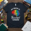 My Brain Is Beautiful Chaos t-shirt with a colorful geometric brain graphic and white text
