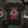 Black t-shirt with red text "MY CAT LISTENS TO METAL" and a winged black cat graphic