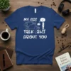 My Cat Talk Shit About You funny quote t-shirt with a cat sitting in a chair and a person looking