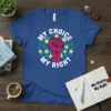 Blue t-shirt with white text "My Choice My Right" surrounding a pink raised fist and yellow flowers graphic