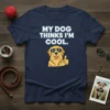 My Dog Thinks I'm Cool text with a cool golden retriever giving a thumbs up on a navy t-shirt