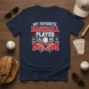 Navy t-shirt with white and red text "MY FAVORITE BASEBALL PLAYER CALL ME MOM" and baseball graphic, baseball mom design
