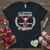My Favorite Cheerleader Is My Girlfriend text with cheerleader graphic on navy t-shirt