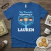 My Favorite Grandchild Is Lauren text with a heart-shaped tree graphic featuring three smiling children on a royal blue t-shirt