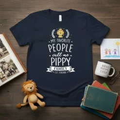 T-shirt with white text reading "MY FAVORITE PEOPLE call me PIPPY FAMILY EST. FOREVER" above a small lion graphic