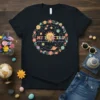 My First Trip Around the Sun birthday t-shirt with celestial sun, planets, and floral wreath graphic