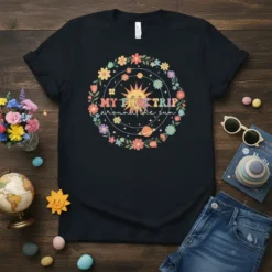 My First Trip Around the Sun birthday t-shirt with celestial sun, planets, and floral wreath graphic