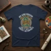 Navy t-shirt with the quote "My Girlfriend Protects Her Asp Like It Was The Ghent Altarpiece" and a graphic of