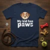 Navy t-shirt with white text "My kid has paws" and a cartoon dog face graphic