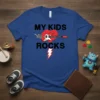 Blue t-shirt with black text "MY KIDS ROCKS" above a red heart and electric guitar held by a skeleton hand