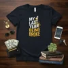 My Last Year Being Broke t-shirt with a rocket launching amidst falling gold coins