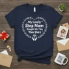 My Lovely Step Mom Bought Me This Shirt text inside a heart wreath graphic on a navy t-shirt