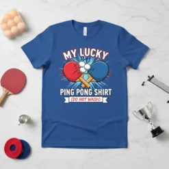 Ping pong shirt design with crossed red and blue paddles, three balls, and text "MY LUCKY PING PONG SHIRT (DO