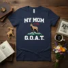 MY MOM is the G.O.A.T. text with a goat graphic on a navy blue t-shirt