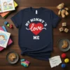 Navy t-shirt with white text "MY MOMMY'S love ME" and a red heart graphic, ideal for mothers