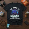 T-shirt with "My Name Is Megan And I Have A Gaming Addiction" text and a colorful video game controller graphic