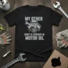 Black t-shirt with "My Other Shirt Is Covered In Motor Oil" text and a graphic of an engine covered in