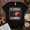 My Pancreas Got Run Over By Reindeer funny Christmas t-shirt design with a reindeer pulling a pancreas graphic and festive