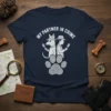 My Partner in Crime t-shirt design with a dog detective and human detective holding magnifying glasses over a paw print