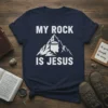 Christian t-shirt with "My Rock Is Jesus" text and mountain graphic featuring Jesus' profile wearing a crown of thorns