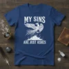 My Sins Are Just Ashes quote with a white phoenix graphic rising from flames on a navy blue t-shirt