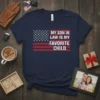 Navy t-shirt with American flag graphic and text "My Son In Law Is My Favorite Child" in white and red