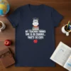 Navy t-shirt with "My Teacher Thinks She Is In Charge.. That's So Cute" text, featuring an owl on books and