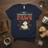 My Therapist Has Paws t-shirt design with dog and cat illustration and paw prints