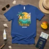Nassau Bahamas t-shirt design featuring a palm tree, sailboat, and ocean view with text "Nassau Bahamas"
