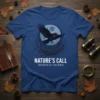 Nature's Call Whisper Of The Wild t-shirt with a black raven flying in front of a moon and nest design