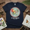 Nature's Embrace Flora & Fauna t-shirt design featuring a butterfly made of branches and flowers, with text below
