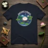Nature's Peace t-shirt design with a lotus flower on a pond, mountains, and moon