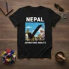 Black t-shirt with "NEPAL ADVENTURE AWAITS" text and a graphic of Boudhanath Stupa with prayer flags and a checkmark