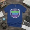 Nerds Rule! text on a blue t-shirt with a circuit board graphic design, perfect for tech and science lovers