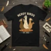 Nerdy Birds Est 2023 T-Shirt featuring three cartoon birds wearing glasses and a beanie, with "NERDY BIRDS EST. 2023" text