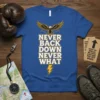 Blue t-shirt with bold white text "Never Back Down Never What" and an eagle graphic above, designed for motivational wear