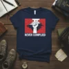 Never Complied t-shirt with a white fist breaking through a red brick wall graphic