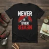 Black t-shirt with "NEVER EVER NEVER" text, a roaring bear, and mountain graphic with a red sun background