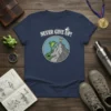 Never Give Up Frog Climbing Mountain graphic tee with motivational quote and cartoon illustration
