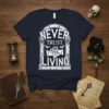 Never Trust The Living gothic t-shirt design with white typography and spooky graphics