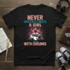 Never Underestimate A Girl With Drums quote with a female drummer graphic on a black t-shirt