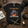 Never Underestimate A Girl With Drums text with drummer graphic on black t-shirt